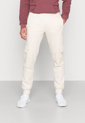 ESSENTIALS - Pantaloni sportivi - white