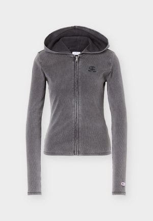 Dark gray fitted zip-up hoodie with long sleeves, front zipper, small logo on chest and cuff, and attached hood.