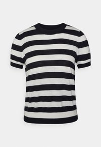 Haut en tricot à manches courtes noir et blanc à rayures, avec un col rond et une coupe ajustée, présentant des rayures alternant entre épaisses et fines.