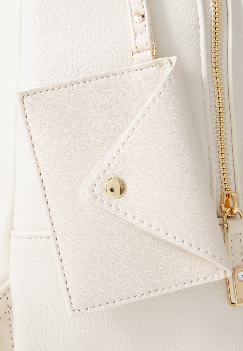 cream leather backpack uk Sixtease Backpack: Stylish, Spacious, and Built to Last for Your Next Adventure! Convertible Leather Backpack – Coconut Cream Meet your new go Buy Cream Back Pack Bags