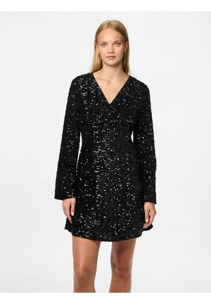 Vestido negro de lentejuelas con mangas largas y escote en V profundo, que presenta una silueta ajustada y un dobladillo corto. Textura brillante en toda la prenda.