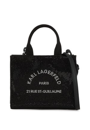 Sac à main noir Karl Lagerfeld avec poignées courtes et bandoulière, orné de cristaux et de texte blanc indiquant "Karl Lagerfeld Paris 21 Rue St-Guillaume."