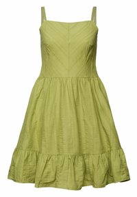 Robe sans manches vert clair avec fines bretelles, corsage ajusté avec coutures en chevrons, et jupe évasée à ourlet volanté.