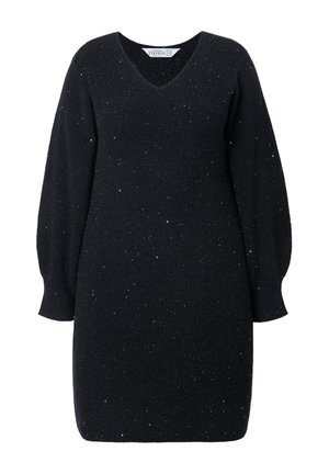 Vestido negro de punto con escote en V, mangas largas abullonadas y detalles metálicos dispersos. Textura suave, silueta ajustada y longitud por encima de la rodilla.
