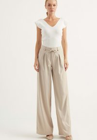 Chiquelle Tygbyxor - beige