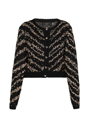 Černý cardigan se zigzag vzorem v béžové barvě, zdobený zlatými korálky. Má knoflíky ve tvaru srdce a zkrácený střih s dlouhými rukávy.