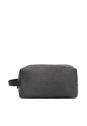Rectangular dark gray fabric toiletry bag with a black leather side handle on a white background.