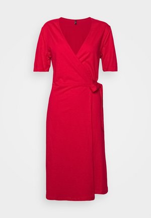 Červené bavlněné šaty zavinovací střihu s výstřihem do V, krátkými rukávy a zavazováním na boku. Materiál je hladký a elastický, nabízí pohodlný střih.