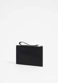 Black nylon zippered pouch with a wrist strap, featuring a rectangular shape, smooth texture, and gold metal zipper detail.
