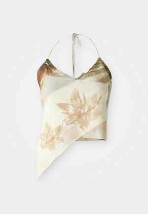 Asymmetrical floral print crop top in muted beige and olive tones, featuring a mesh texture, halter neck ties, and a draped design.