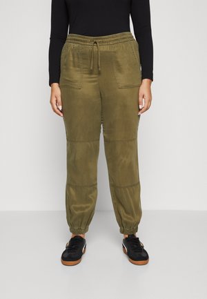 Khaki jogger pants with an elastic waistband, drawstring, two front pockets, and elastic cuffs, featuring a smooth, soft texture.