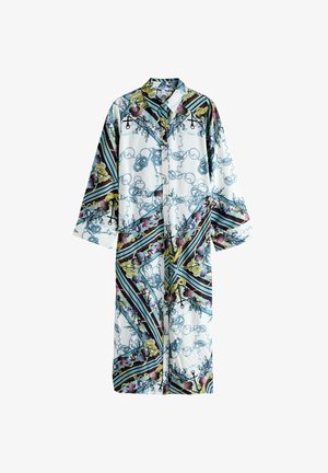 Bata larga abotonada de tela ligera, con un estampado colorido de temática marina con conchas y líneas onduladas sobre un fondo blanco.