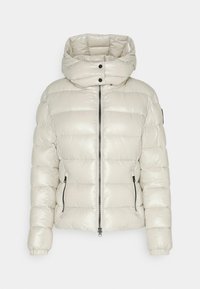 Lys cremefarvet polstret vinterjakke med høj krave, hætte med trykknapper, frontlynlås og lynlåslommer i siderne, elastiske manchetter.