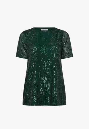 Vihreä lyhythihainen paita, joka on päällystetty paljeteilla, ominaisuutena pyöreä pääntie ja löysä istuvuus. Tekstuuri on kiiltävä ja heijastava.