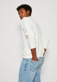 Antony Morato CHUPA CHUPS REGULAR FIT WITH PLASTIC AND FLOCK PRINT - Sportska majica - cream