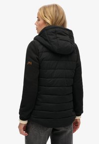 Superdry & Co HOODED STORM HYBRID PADDED - Vinterjakker - black