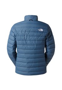 Blue quilted insulated jacket with a high collar, long sleeves, and The North Face logo on the upper back right side.