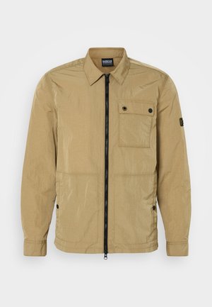 Beige, lightweight jacket in a crinkled texture with a front zipper, buttoned chest pocket, and side pockets. Features a collared design.