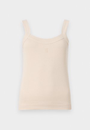 Béžový rebrovaný top s tenkými ramienkami a zaobleným výstrihom. Na prednej strane sa nachádza vyšité logo. Hladká textúra, priliehavý strih.