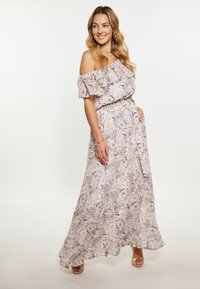 Off-shoulder bloemen maxi jurk in lichtpaars met gele accenten, met gekruiste mouwen, een gestrikte taille en vloeiende stof.
