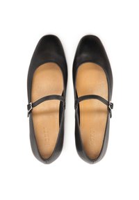 Black leather Mary Jane shoes feature a square toe, a smooth finish, and an adjustable strap with a silver buckle. Tan insole.