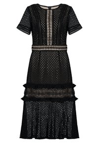 Svart spets midiklänning med korta ärmar, geometriska och blommönstrade utskärningar, volanger och nude foder under.