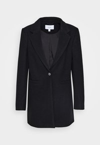Blazer nero con un design strutturato, rever a punta, chiusura con un bottone e due tasche frontali. Tessuto testurizzato con un interno liscio.