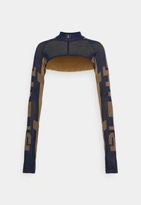 Top corto de manga larga hecho de tela transparente en tonos azul marino y marrón, con un cuello alto, cremallera frontal y patrones geométricos en beige.