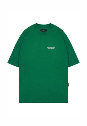 Green cotton t-shirt with a relaxed fit, short sleeves, crew neckline, and printed text "RETERNITY CREATIVE DEPARTMENT" in white.