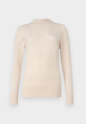 Crew neck genser i myk beige stoff, med lange ermer og ribbestrikkede mansjetter. Glatt tekstur med en lett avslappet passform.