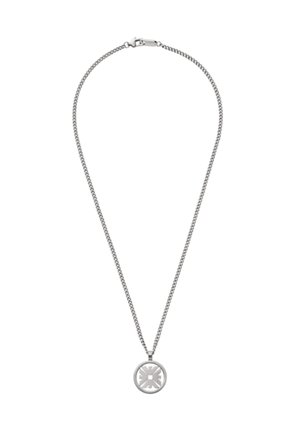 Silver chain necklace with a round pendant featuring a geometric design. The chain has a smooth, polished texture.