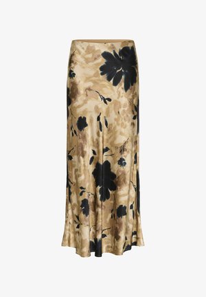 Jupe longue en satin beige avec de grands motifs floraux noirs et marron et une texture lisse et fluide.