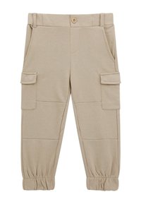 Beżowe spodnie cargo z elastycznymi mankietami, zapięciem na guziki, szlufkami na pasek, bocznymi kieszeniami i kieszeniami na klapki na udach, zaprojektowane do codziennego noszenia.