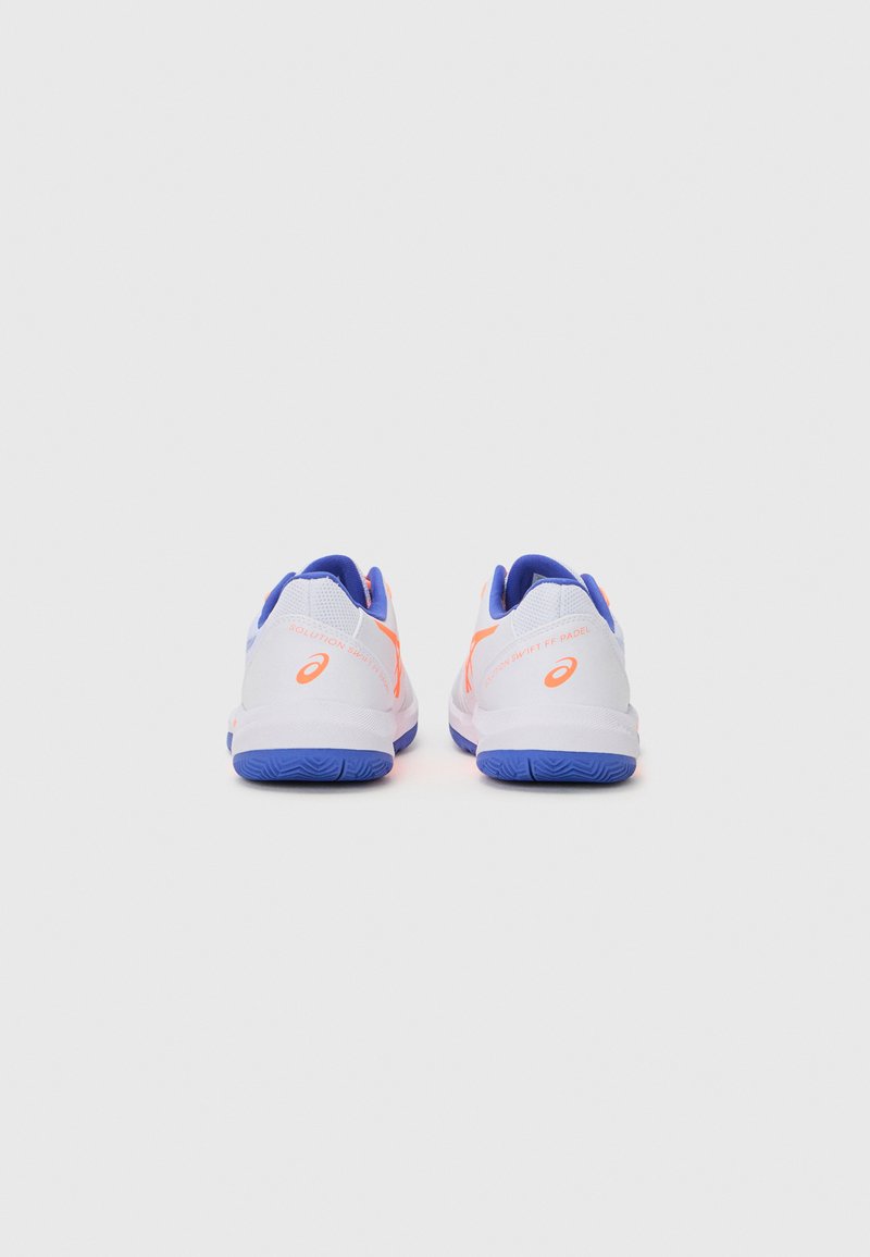 White athletic shoes with orange and blue accents, featuring a smooth texture and a rounded design. Back view shows logo and detailed stitching.