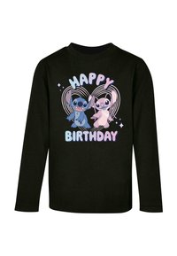Must mustavariant pikkade varrukatega särk, millel on koomiksitegelased käed püsti, tekst "HAPPY BIRTHDAY" pastelltoonides, ümbritsetud südamekontuuridega.