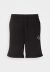 MONOLOGO - Pantaloni sportivi - black