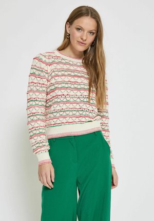 Pull en tricot crème avec des rayures horizontal multicolores et un motif en vagues. Doté d'un col rond et de poignets et d'un ourlet côtelés.