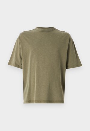 Olive green cropped t-shirt made of soft fabric, featuring a high crew neck and short sleeves with a relaxed cut.