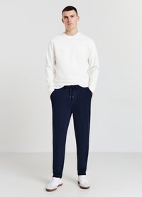 Calliope GINNICI CON POLSINI - Jogginghose - blu notte