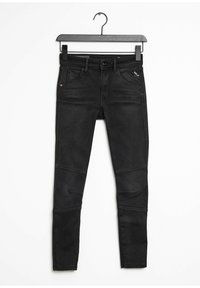 Svarta denimjeans med slim fit, med knappknäppning, fem fickor och kontrasterande veckdetaljer vid knäna.