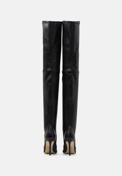 Stuart Weitzman Škornji z visoko peto - black