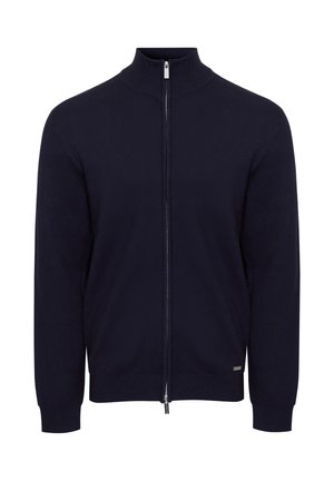 Marineblauwe trui met rits en hoge kraag, gemaakt van glad, flexibel stof. Voorzien van lange mouwen en een subtiel logo-label aan de zoom.