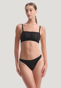 Wolford NET LOGO STRING - String - black