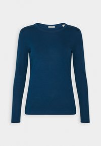 Camiseta de manga larga con cuello redondo en azul oscuro, hecha de tela suave. Presenta una forma ajustada y costuras planas para un aspecto elegante.