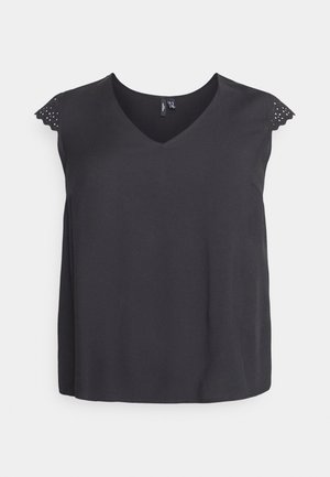 Top noir sans manches avec un décolleté en V et des découpes en forme de vagues décoratives sur la couture de l'épaule. Tissu doux avec une coupe décontractée.