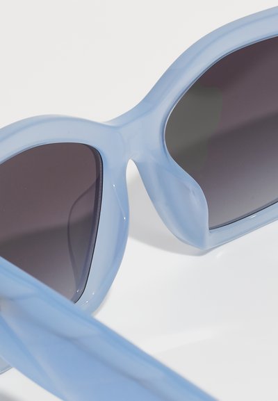 Tory Burch Akiniai nuo saulės - milky light blue