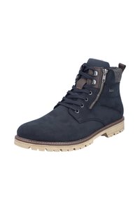 Bottes chelsea en suède bleu marine avec un col texturé gris, détail de fermeture éclair en métal et semelle en caoutchouc crème. Devant lacé, design moderne.