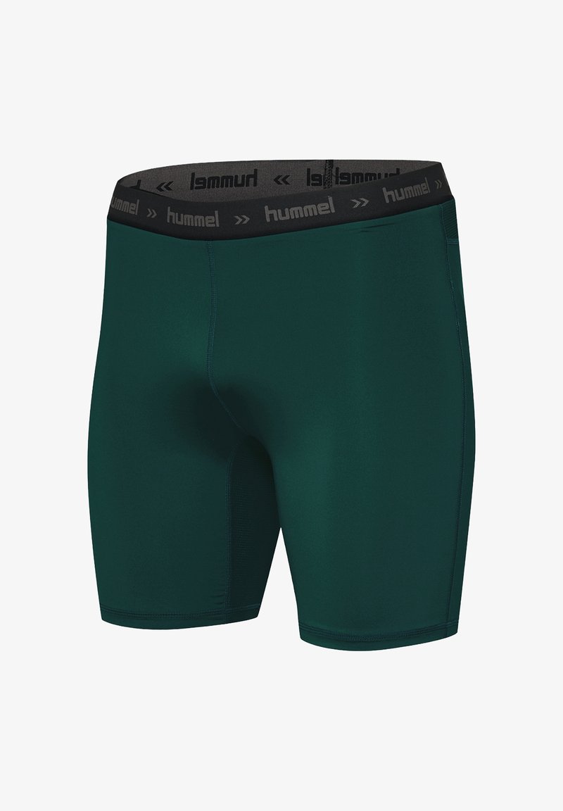 Shorts de compression en tissu vert foncé, dotés d'une ceinture élastique noire avec le logo "hummel", texture lisse et design ajusté.