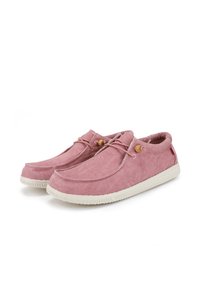 Pink suede shoes with a rounded toe design, featuring a beige rubber sole and wooden accents on the laces for added detail.