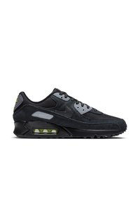 Baskets Nike Air Max noires avec unité d'amorti à air visible et accents gris sur les lacets et les panneaux latéraux, présentées en profil.